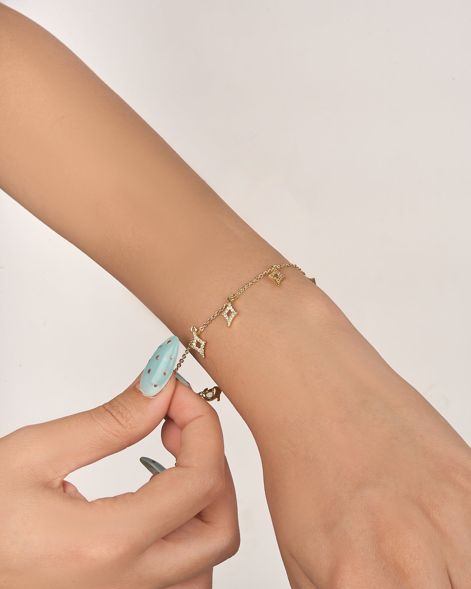 Scintilla Star Charm Bracelet in Gold